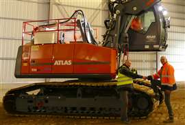 The handover of the armoured Atlas excavator