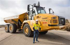 Bibhrajit Halder, SafeAI CEO, with retrofitted Cat 725 truck