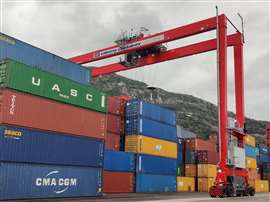 Red Liebherr electric RTG crane at Salerno Container Terminal in Italy