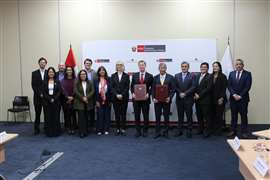 The signing of a memorandum of understanding between NEC, the UK government, and the Peruvian government