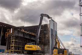 Fire-damaged structure demolished