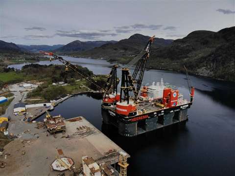 Aerial view of Heerema Marine Contractors decommissioning the platform with Sleipnir heavy lift vessel